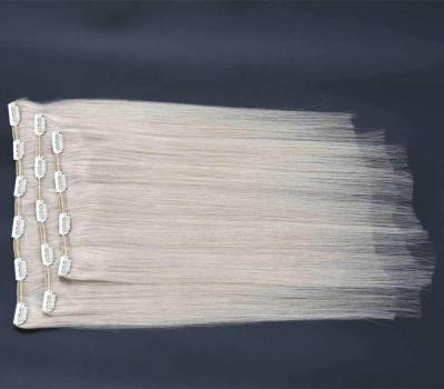 China Silky Straight Wave Long Lasting Gray Remy Hair Extensions Clip In for sale