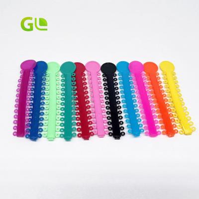 China Plastic Elastic Orthodontic Consumables Dental Materiales Transparent Colorful GL Ligature Tie for sale