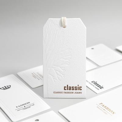 China Recyled Printed Logo Hangtags Garment Clothes Custom Hang Tags Luxury Swing Tags Set String Pin Design Paper Clothing Tags for sale
