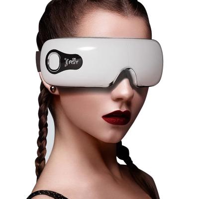 China Hot Sale Factory Wholesale Portable Eye Massager Wireless Smart Music Pink Eye Fatigue Care Massage Heating en venta