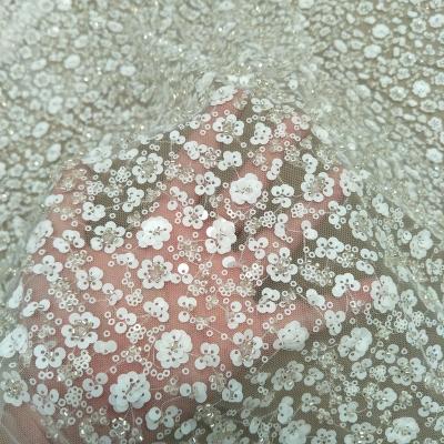 China Other Fashion Wedding Dress Gown Lace Fabric With Pearls And 3D Sequins Beading Flower Lace 130cm Width Sale By The Yard for sale