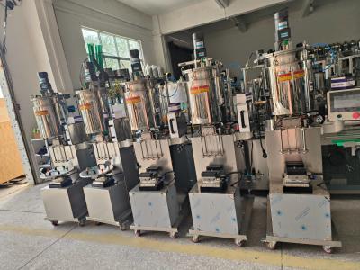 China Semi-automatic Mascara And Lipgloss Filling Machine Vertical Quantitative with Heating and Mixing Function for sale