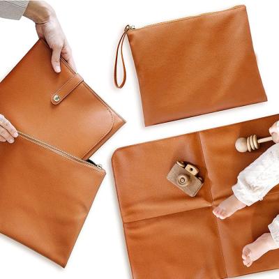 China Mummy Large Capacity Bag Custom Logo Easy To Clean Leather Makeup Bag And Fold PU Baby Diaper Changing Pad And for sale