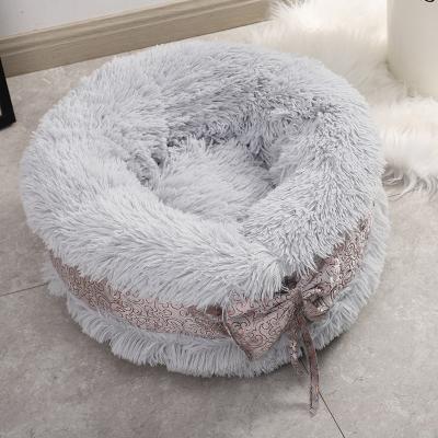 China Breathable Cat Litter Keeps Warm in Partially Enclosed Round Pet Nest Winter Plush Bowknot Pet Kennel for Cats and Dogs for sale
