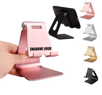 China Custom Adjustable Aluminum Mobile Phone Stand Tablet Desk Holder With Laser Engraved Logo 100*70*80MM for sale