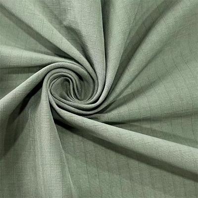 China Tejido de tafetá de estiramiento de curvatura a cuadros mate 70D+40D*160D+160D/2 para ropa exterior en venta