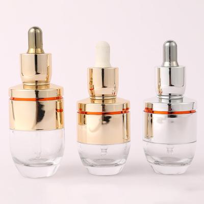China Senior PAK Unique Design Customize Label Printing Empty Glass CBD Serume Oil Dropper Bottle with Silver or Gold Top for sale