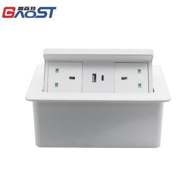 China Convenient UK Hidden Mounted Power Outlet Power Solution Charging Hydraulic Pop Up Outlet Box With USB-C Top Wireless Charging Desk for sale