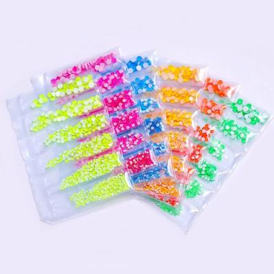 China Bright Colorful Nail Beauty Products Nail Crystals Around Flatback Glass Rhinestones For 3d Charms Nail Art for sale
