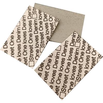 China Recycled Private Leather Garment Labels Custom Printed Copper Color Apparel Logo for sale