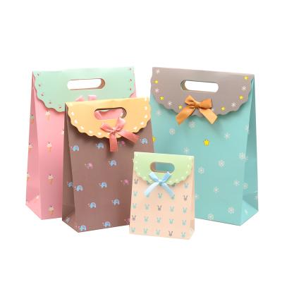 China Customized craft item industrial outdoor flat color custom size paper handbag shopping bag cake paper bag food packaging biodegradable gift for sale