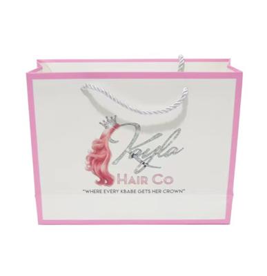 China New Materials Gold Hot Foiled Luxury Clothing Logo Reused Retail Bag Stamping Matt Kraft Paper Bag With Color Cotton Rope Satin Handles for sale
