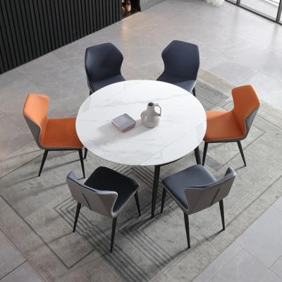 China (Modern Designer Other) Cheap Nordic Adjustable Plastic Pu Leather Upholstered Modern Dining Chairs for sale