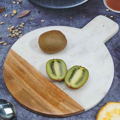 China Sustainable Natural Wooden Marble Cutting Board Round Shape Chopper With White Marble Handle Cheese Boards for sale