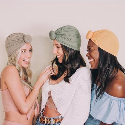 China European And American Style Parent-child Custom Earflaps Logo Hat For Wholesale With Sweet Bun Caps Spring And Autumn Hats Women Turban Sleeve Hats for sale