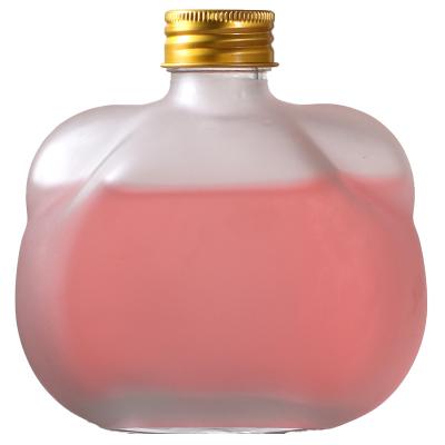China Wholesale Cute Lurury Unique Clear Empty100ml 250ml Frosted Glass Wine Bottle With Black Silver Gold Screw Lid for sale