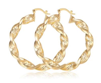 China Fashion 18K Nickel Free Simple Clip On Twisted Circle Earrings Women Brass Jewelry for sale