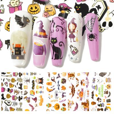 China Nail Art Decorations 1 Box Nail Art Transfer Foil Paper Sticker Christmas Halloween Mixed Festival Design Decal Decoration Manicure Accessories for sale