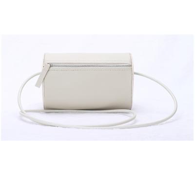 China 2021 New Style Fashion Customized Logo Genuine Leather Beige Hand-Held Or Single-Shoulder Satchel Bags For Women for sale