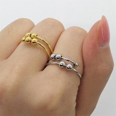 China Trend Stainless Steel Jewelry Moving Person Spinner Rings Frosted Ball Gold Plated Spinner Open Adjustable Worry Ring for sale