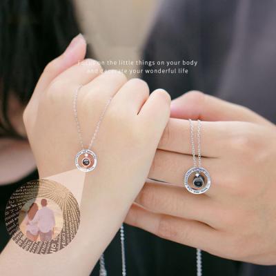 China Customized Korea Style Sterling Silver I Love You In 100 Languages Photo Couple Projection Necklace Custom Made for sale