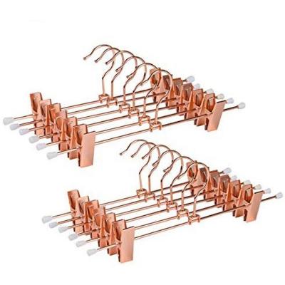 China Amber Home Shiny Metal Slacks Workable Pants and Skirt Hanger with Adjustable Clips Hang Rack with Swivel Hook for sale
