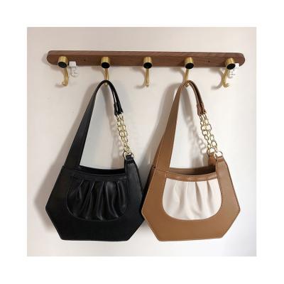 China Fashion Geometry Ladies Personality Contrast Color Shoulder Armpit Pins Paneled Women Day Irregular Shaped Grabs Handbags Women for sale