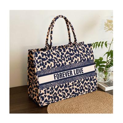 China Fashion New Fashion Canvas Tote Bag 2021 Large Capacity Leopard Letters Spring Summer Women's Large Brand Shoulder Bag Customer Handbag for sale