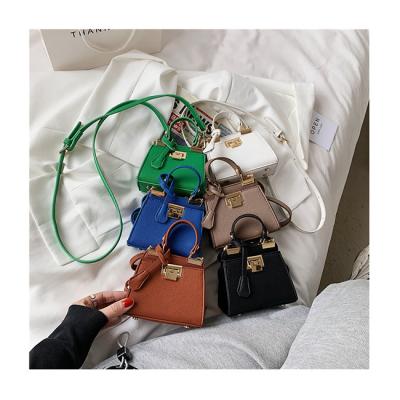 China 2021 Designer Fashion Personality Ladies Summer Handbags Lock Litchi Pattern Mini Shoulder Purses Luxury Handbags For Women Tote Bolsa for sale