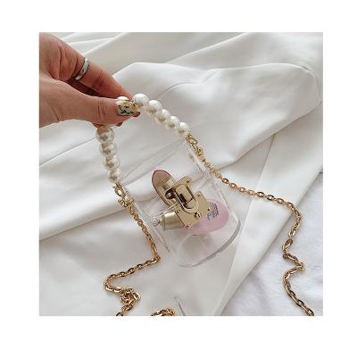 China Fashion Luxury Mini Pearl Chains Clear Handbag Female 2020 Ins Fashion New Lock Shoulder Small Messenger Bags Transparent Bucket Bag for sale