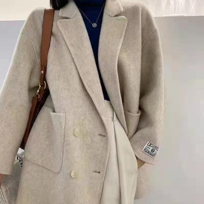 China Customized viable stylish and fashionable dishonest cashmere medium coat, suit collar, solid color cross ladies coat for sale