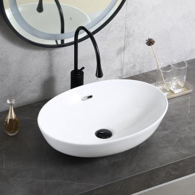 China HY5034 Oval Shape Counter Top Ceramic Hand Wash Basin Easy Clean For Cabinet for sale