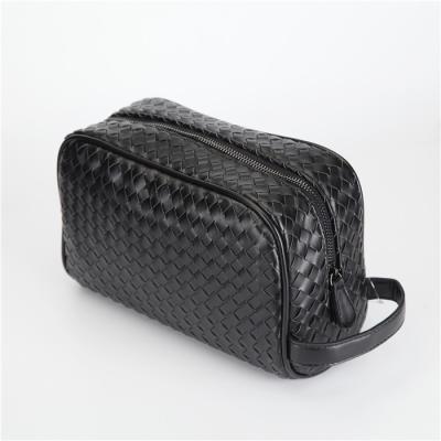 China New Leather Soft Outdoor Grip Cash Money Wholesale Item PU Purse Zipper Woven Clutch Bag for sale