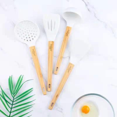 China Eco - Friendly Silicone Kitchen Accessories Sustainable Cookware Sets Handle With Your Logo for sale