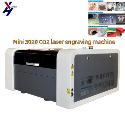 Китай M2 Ruida Awc Topwisdom System 4040/3050/3020/4060 CO2 лазерная гравировка и резка для бумаги MDF продается