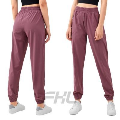 China 2022 New Secret Zipper Pocket Breathable High Waist Fitness Pants Loose Casual Gaiters Women Better Than Lulu for sale