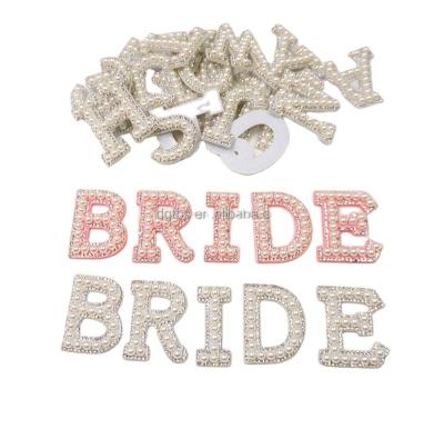 China Viable Wholesale Custom Glass Rhinestone Hot Fix Bead Letter Patches For Apron for sale