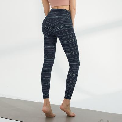 China Breathable Widely Used Sports Fitness Compress Woman Yoga Legging Set for sale