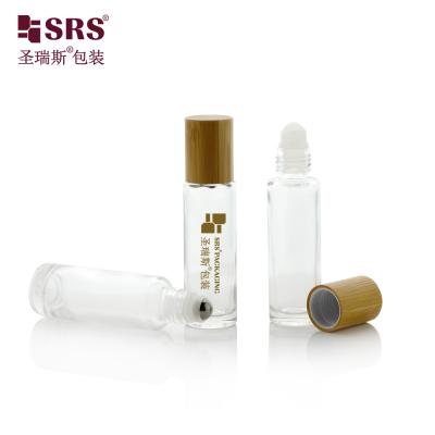 China 15ml Wall Glass Roll on Bottle Set With Bamboo Cap For Essential Oils for sale