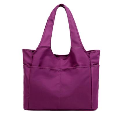 China Custom Bags Sublimation Handbags Logo Solid Nylon Large Tote Waterproof Designer Women Bag With Pocket for sale