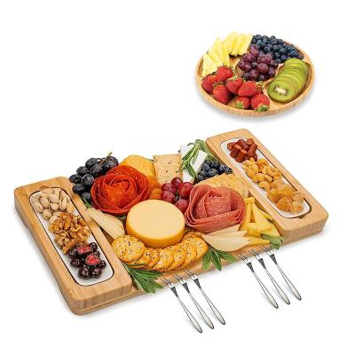 China Sustainable Bamboo Platter Serving Tray For Wine Crackers Brie Meat and Knife Round Wooden Charcuterie Board Set Wood Serving Trays for sale