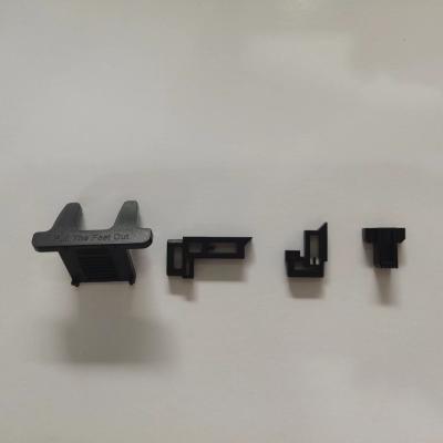 Chine moulage par injection en plastique adapté aux besoins du client par tolérance du ± 0.005mm pour les pièces noires à vendre