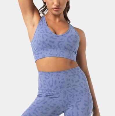 China Breathable Women's Latest Medium Support Superdry Sport Performance Leopard Print Racerback Cut Out Sports Bra for sale