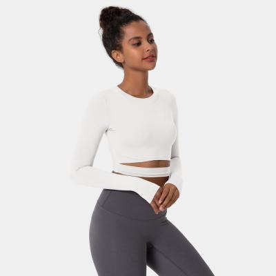 China Breathable Women's White Crop Top Crewneck Cut Out Long Sleeve Cropped Sports Crop Top With Thumb Hole for sale
