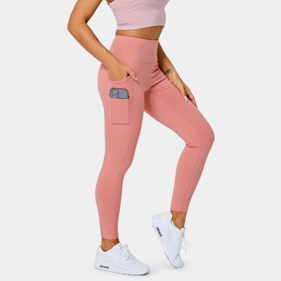 China Breathable High Waisted Double Pocket Plain 7/8 Gym Leggings For Women for sale