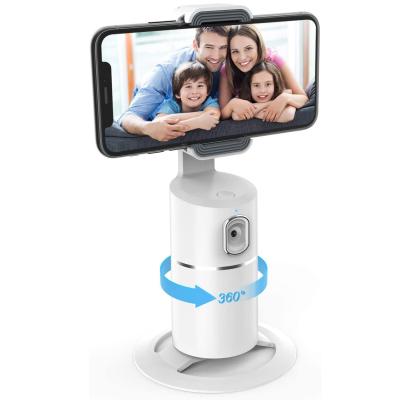 China Adjustable 360 Face Tracking Phone Holder No APP Quick Face After Desktop Tripod For Body Selfie Vlog Live Ai Automatic Tracking Camera for sale