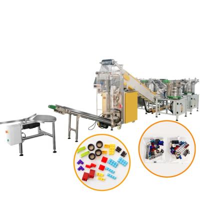 China Factory Custom Plastic Small Commodity Parts Counting And Packaging Machine For Toy Bricks for sale