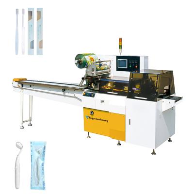China Economic Type Small Key Electric Toothbrushes Hotel Food Supplies Flow Packaging Machine by FEIYU Machinery for sale
