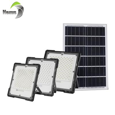 China IP67 SMD 50w 100w 150w sports stadiums bright high lumen outdoor waterproof camping led solar flood light for sale