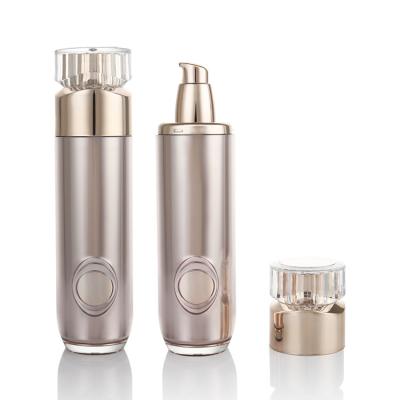 China Round Gold Acrylic Cosmetic Airless Pump Bottle 50ml 100ml for sale